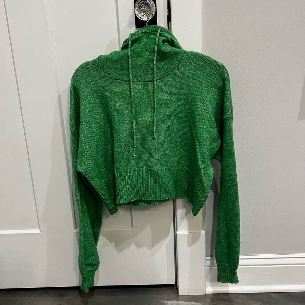 Green hooded sweater